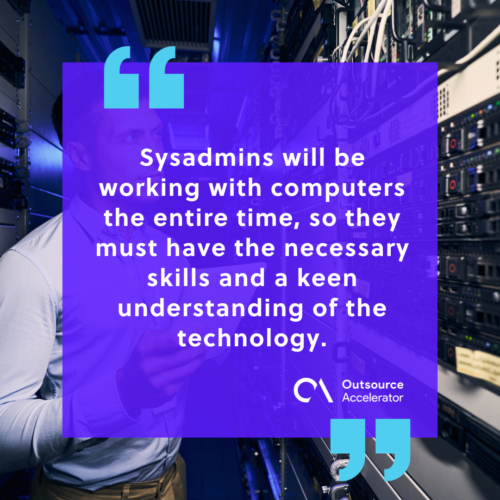 concentrated tranquil system administrator inspecting networking equipment