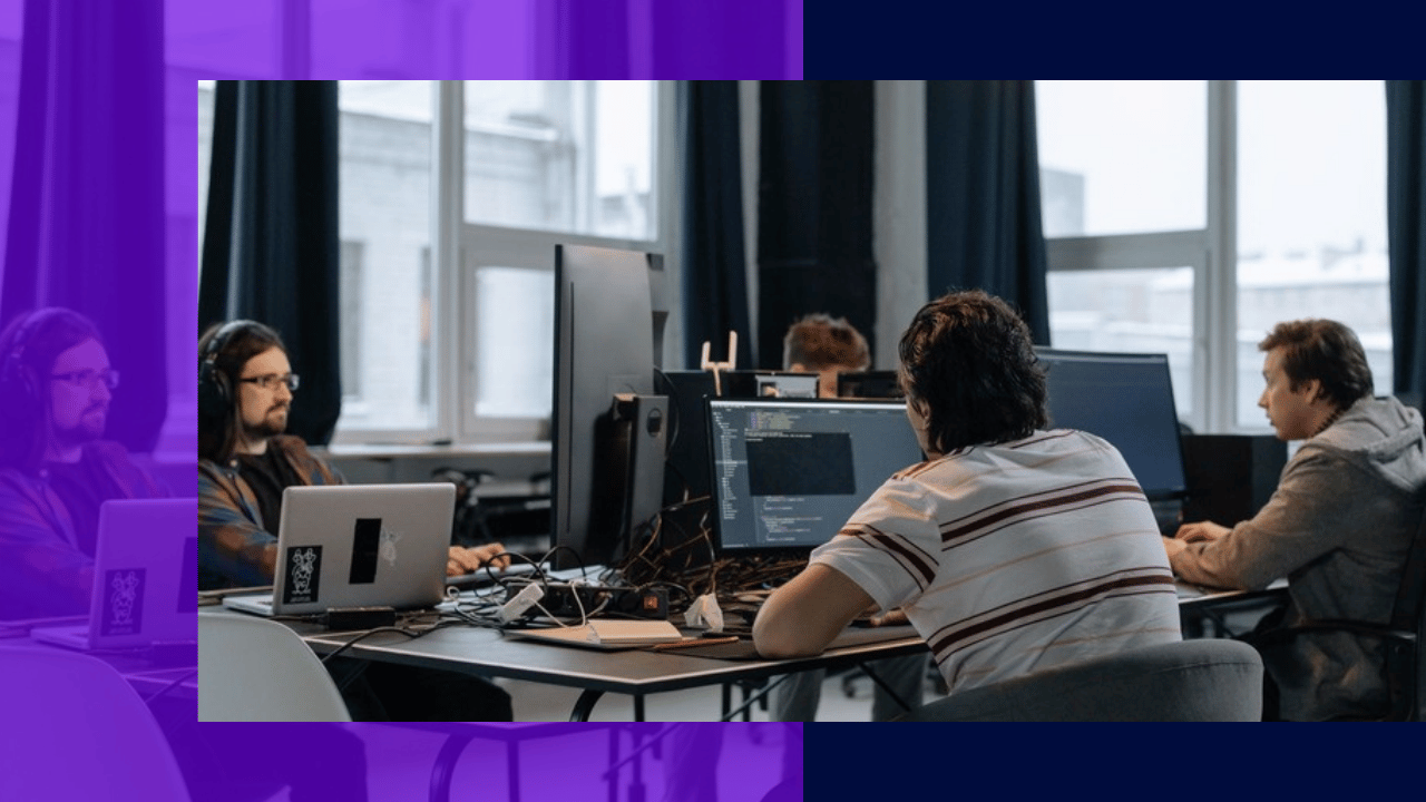 AI-driven back office outsourcing - team working at computers in an open office