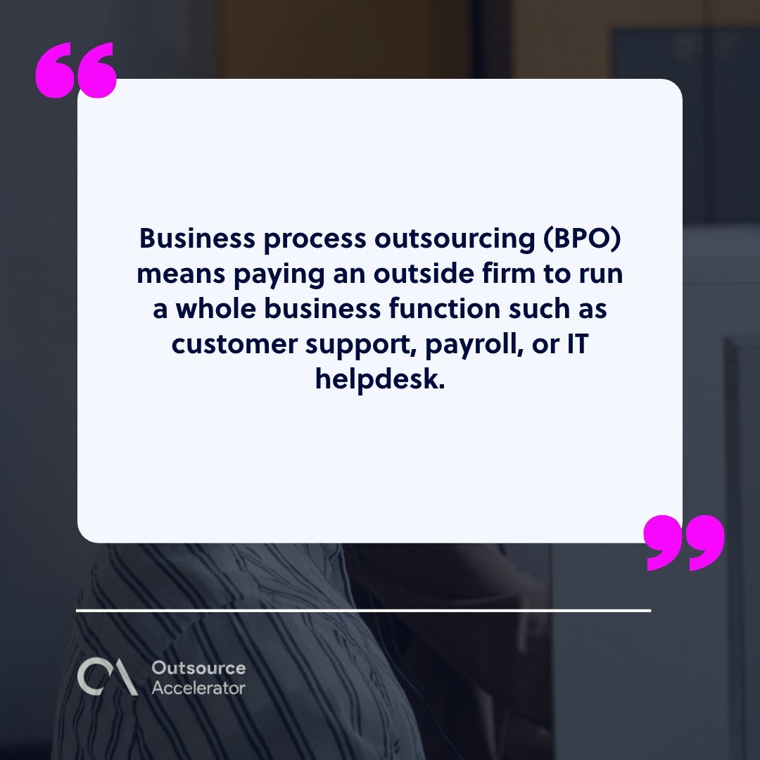 Business process outsourcing (BPO) - row of agents wearing headsets at a shared desk