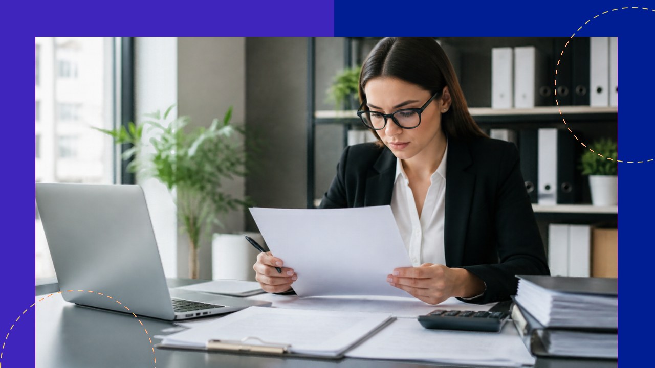 A finance professional reviewing compliance documents at a desk