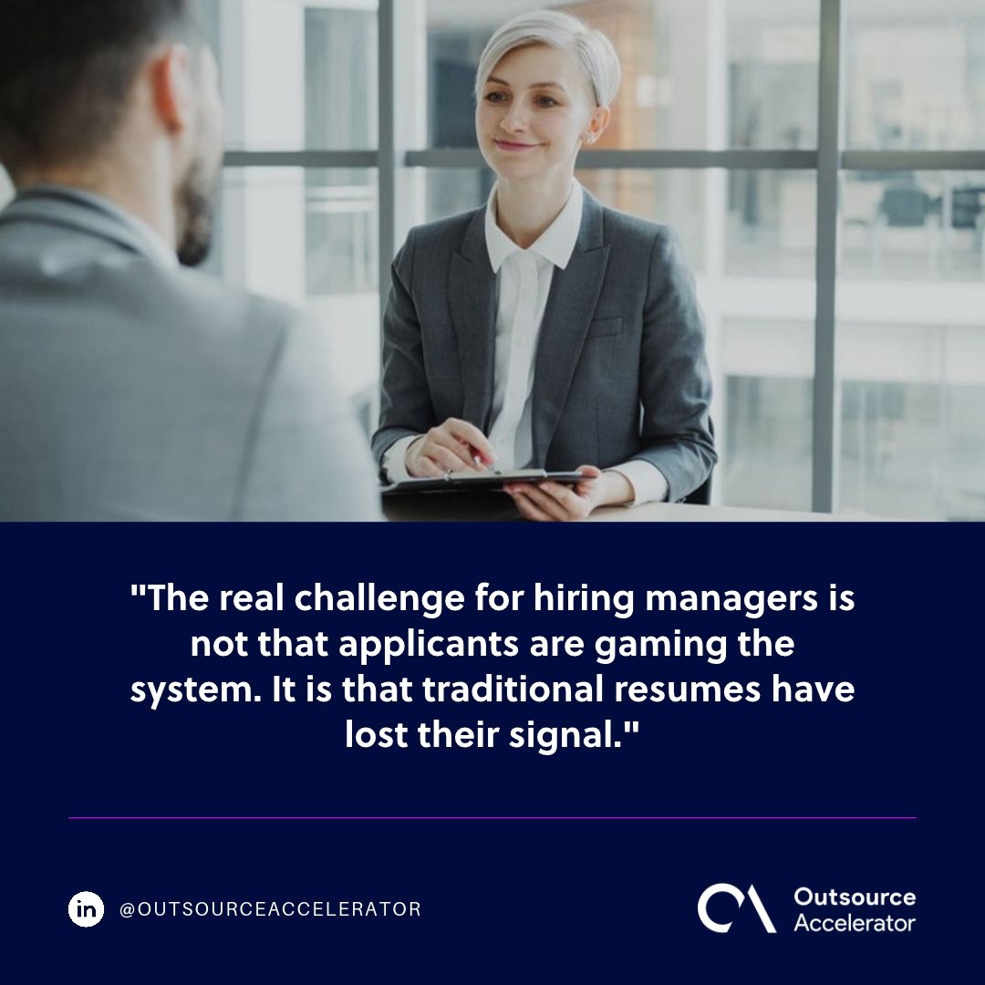 Hiring manager holding a clipboard during an interview