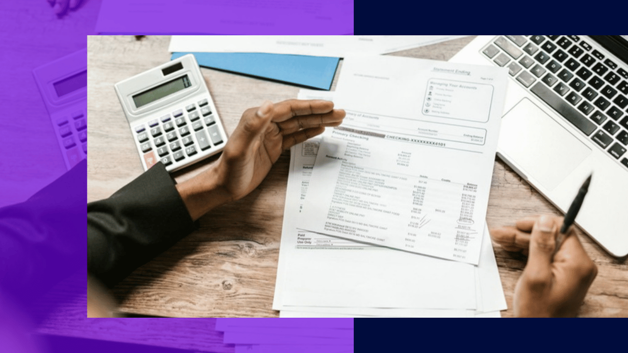 Making Tax Digital for ITSA - accountant reviewing financial documents with a calculator and laptop