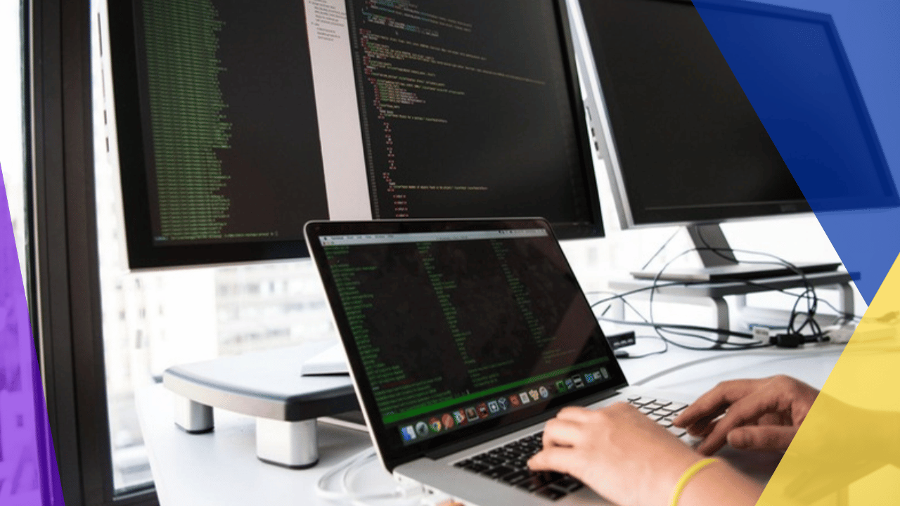 how to protect IP when hiring offshore developers - developer writing code in front of multiple monitors