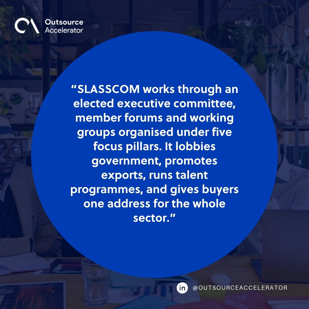 SLASSCOM - technology professionals collaborating in a bright workspace