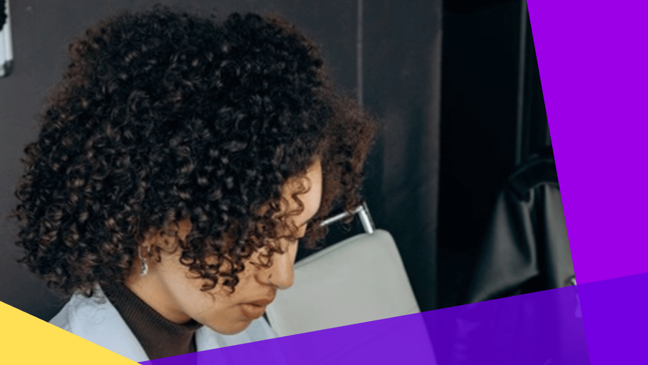 UK accounting talent shortage - accountant working on calculations at a desk
